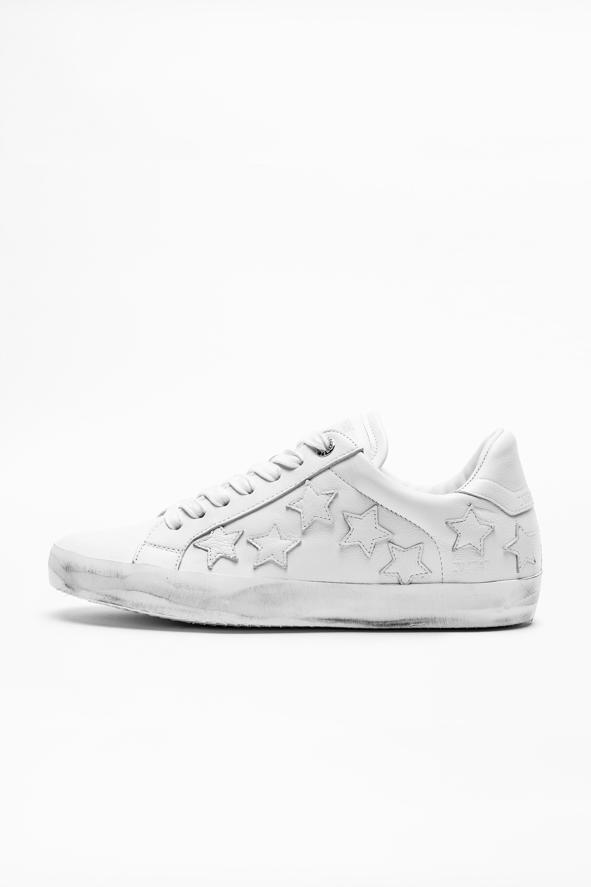 white sneakers with stars on them