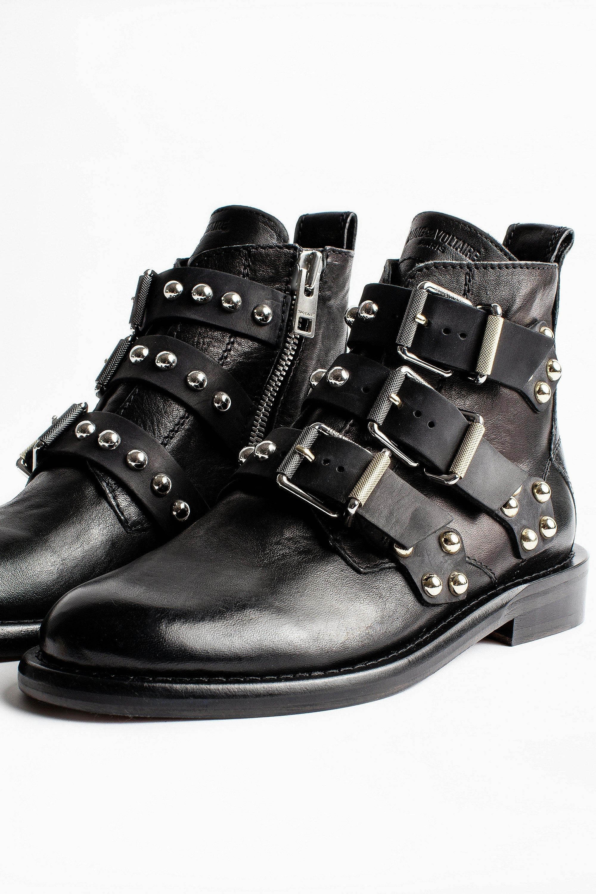 black ankle boots with buckles and studs