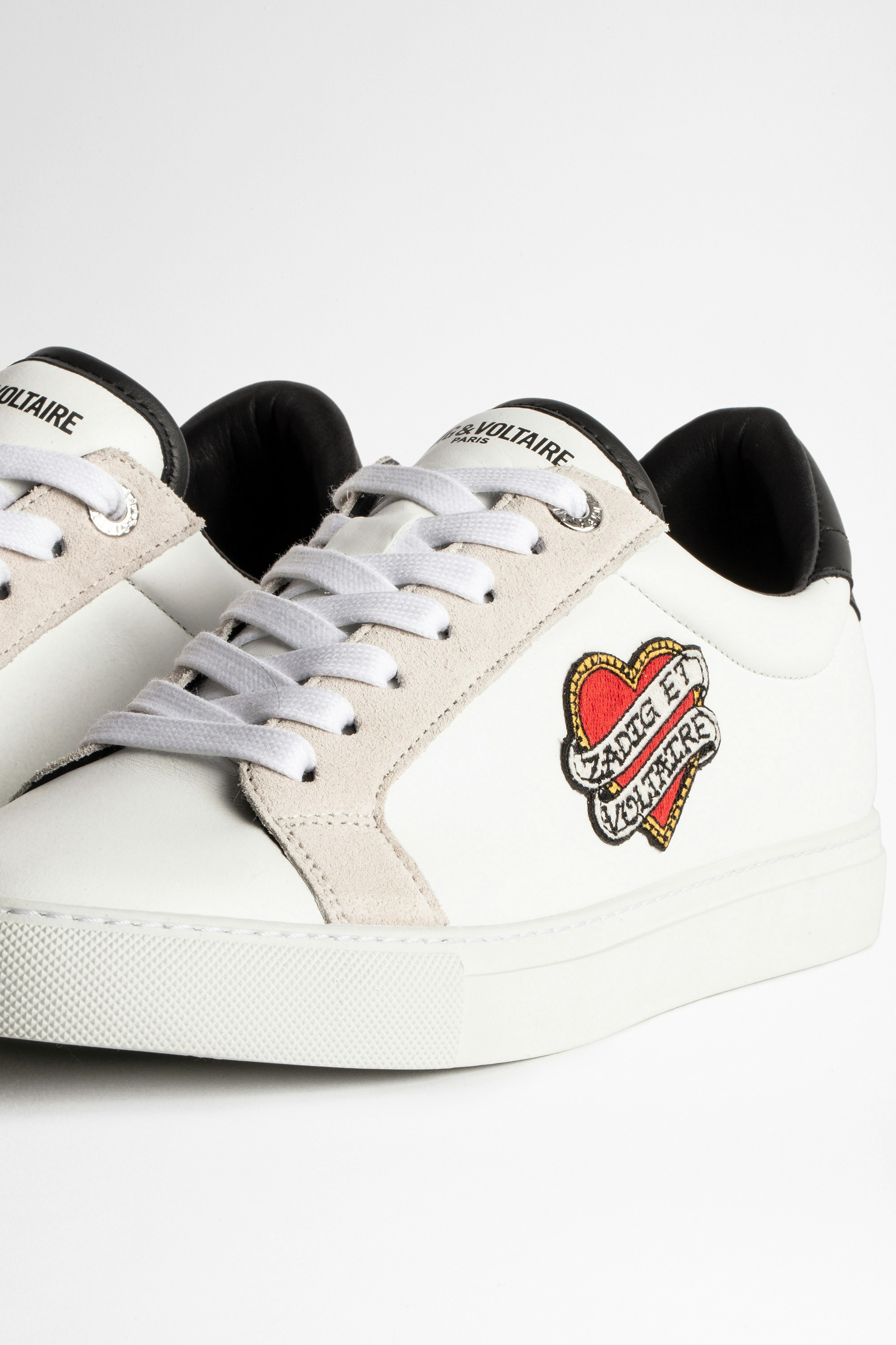 white sneakers with heart